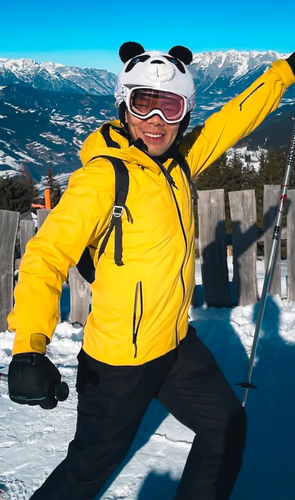 Richard skiing on a snow-covered slope.